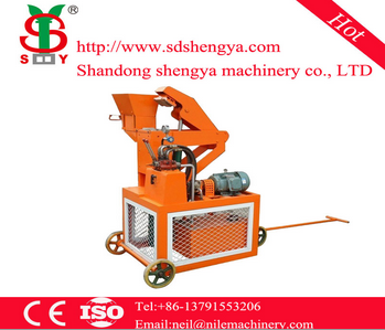 Interlocking brick making machine